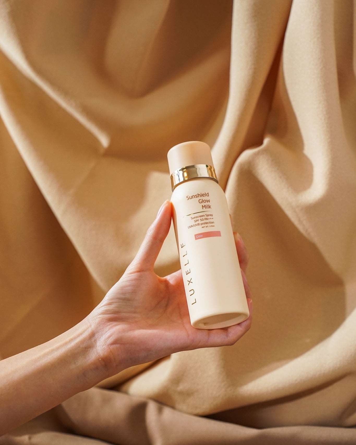 Sun-kissed beauty with Luxelle's Glow Milk